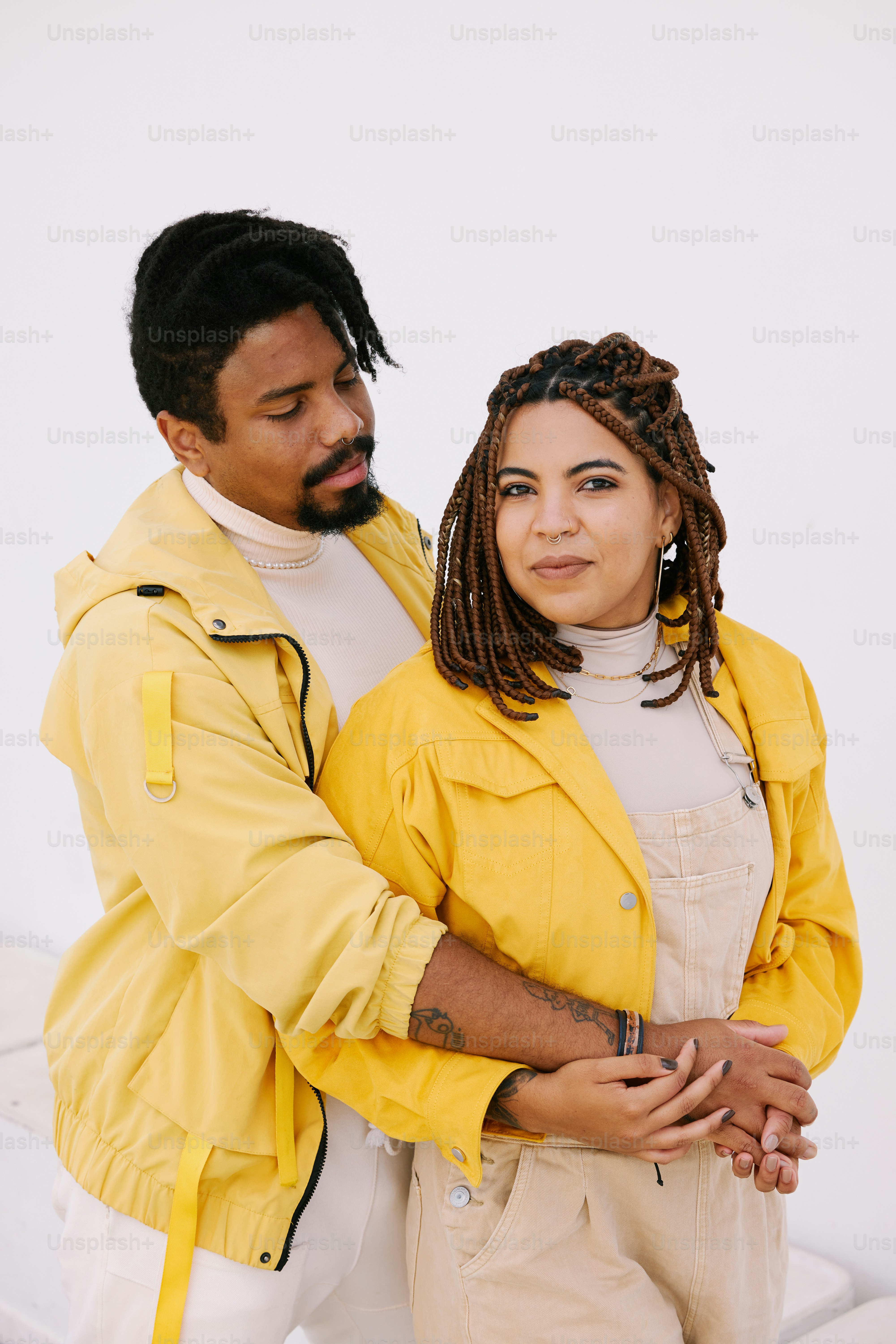 a man and a woman standing next to each other