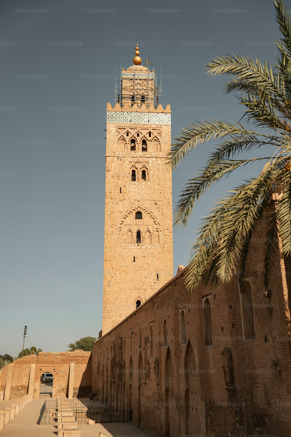 a tall tower with a clock on the top of it