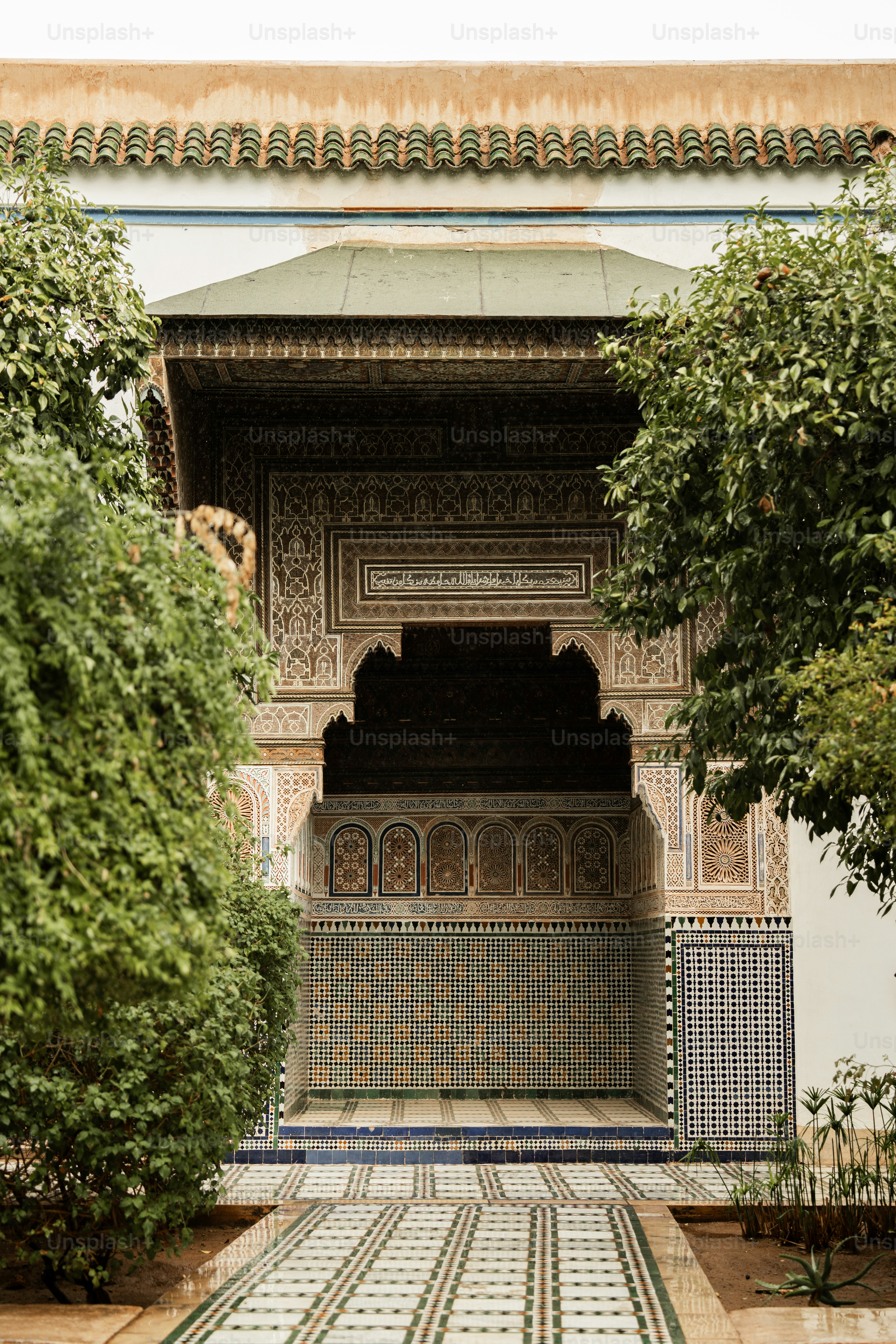 a building with a tiled walkway in front of it