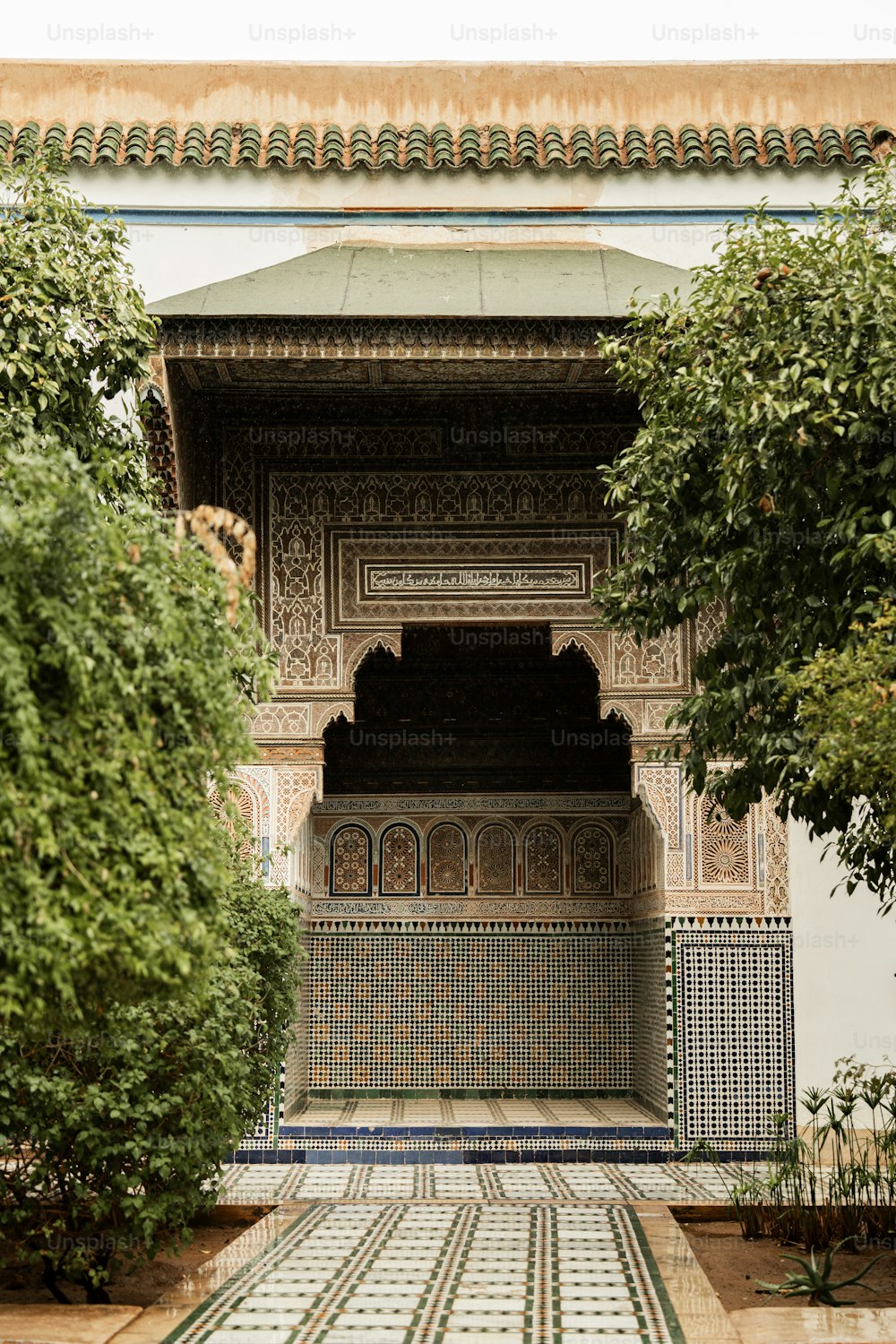 a building with a tiled walkway in front of it