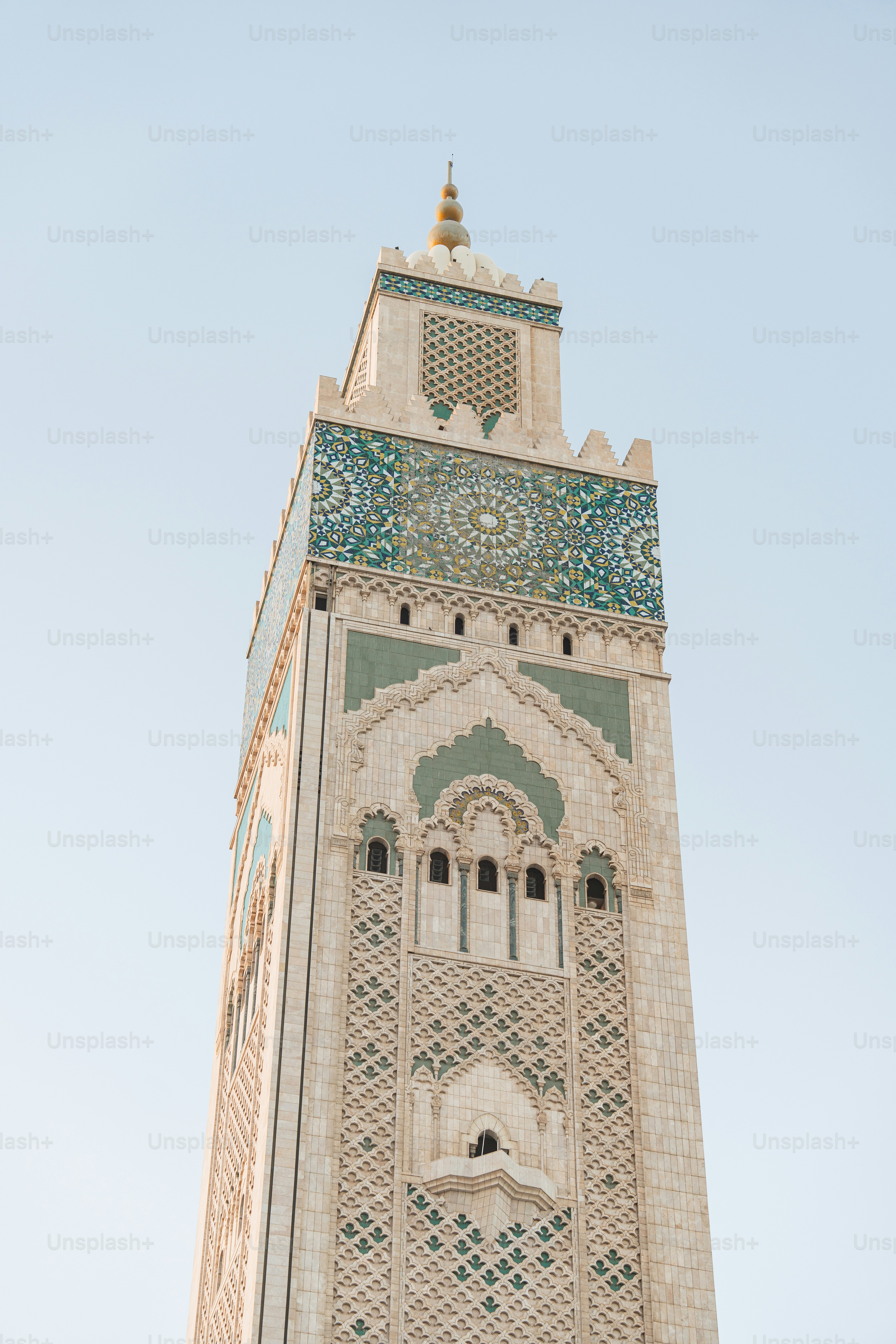 a tall tower with a clock on the top of it