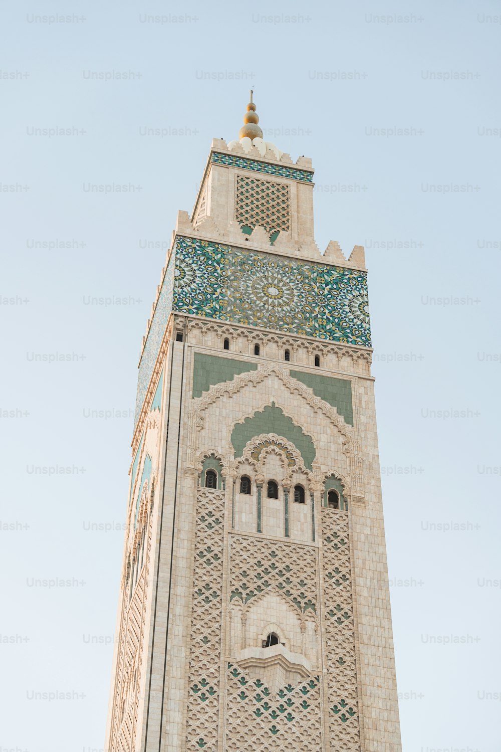 a tall tower with a clock on the top of it