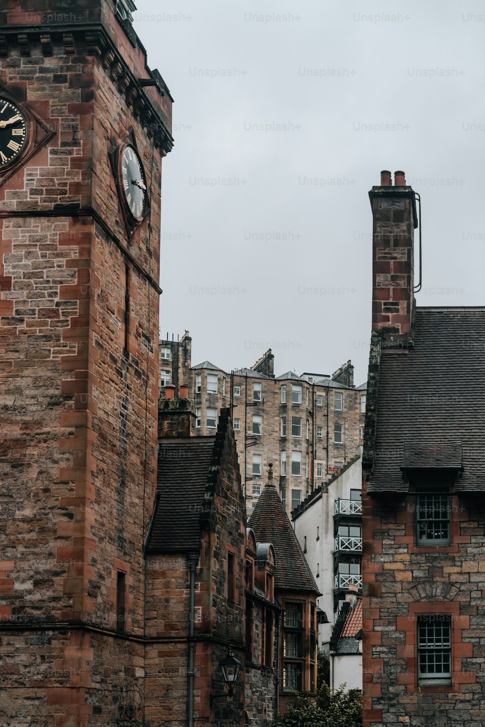 a brick building with a clock on the side of it