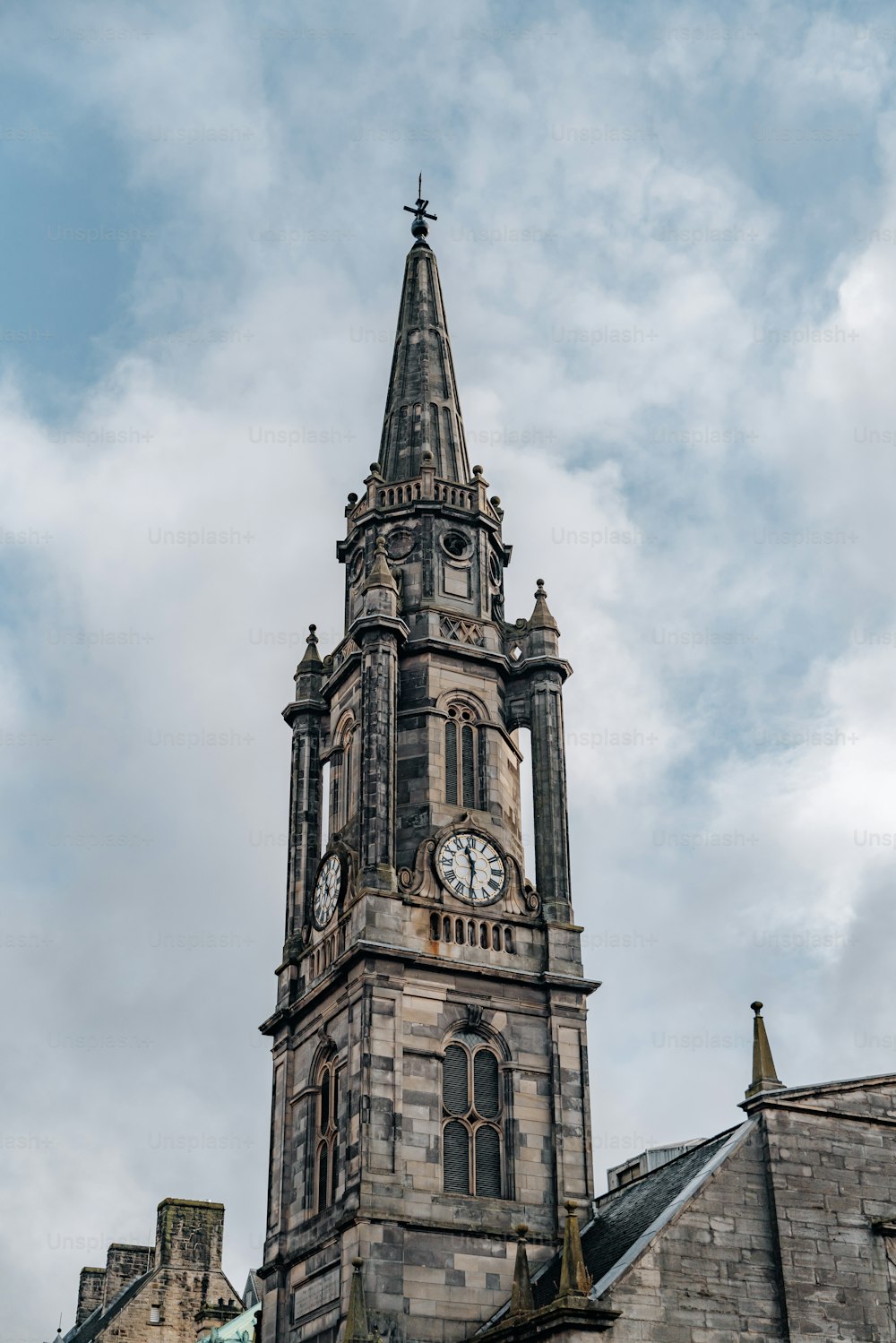 a tall tower with a clock on the top of it