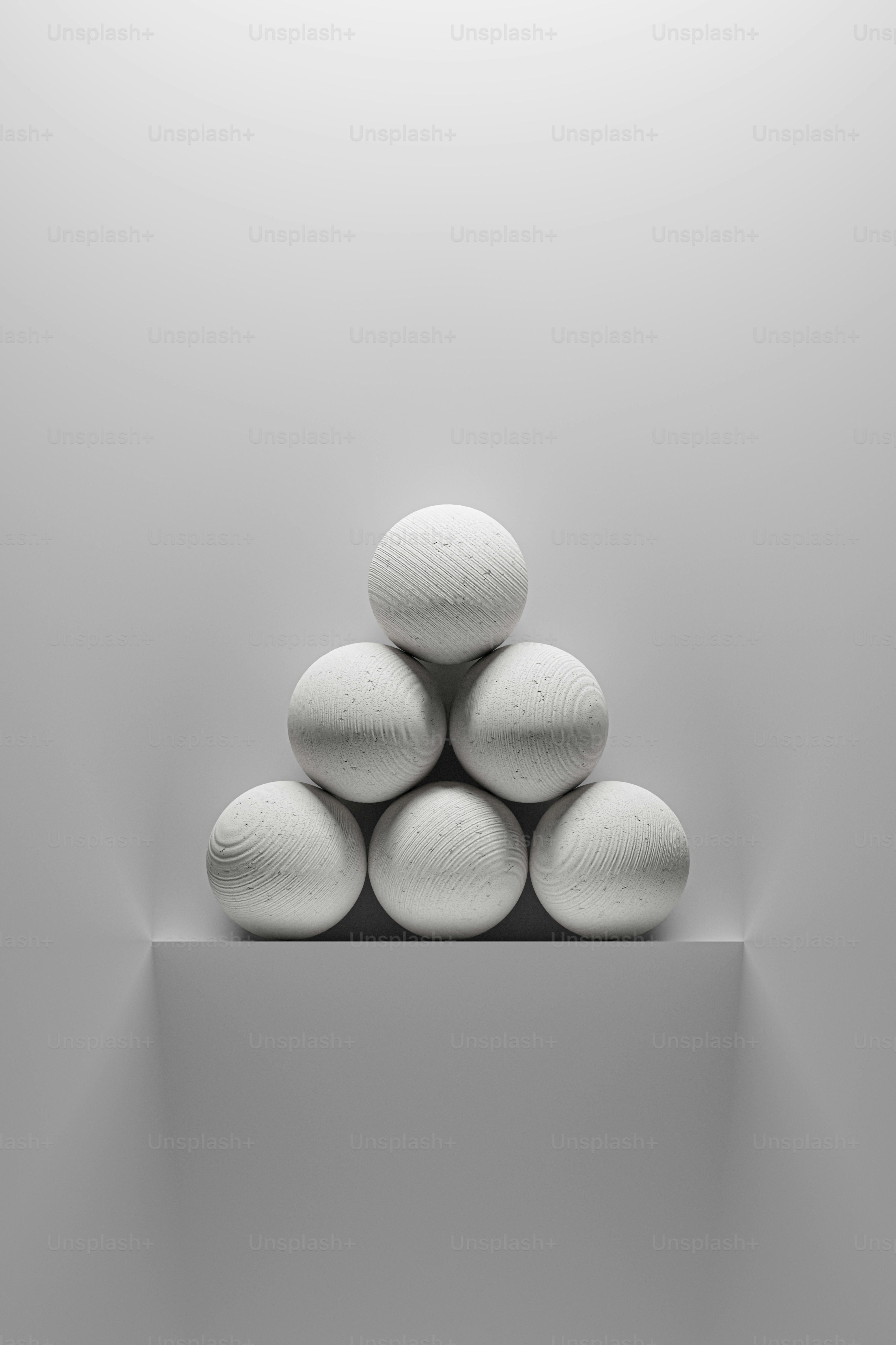 a pile of white rocks sitting on top of a shelf