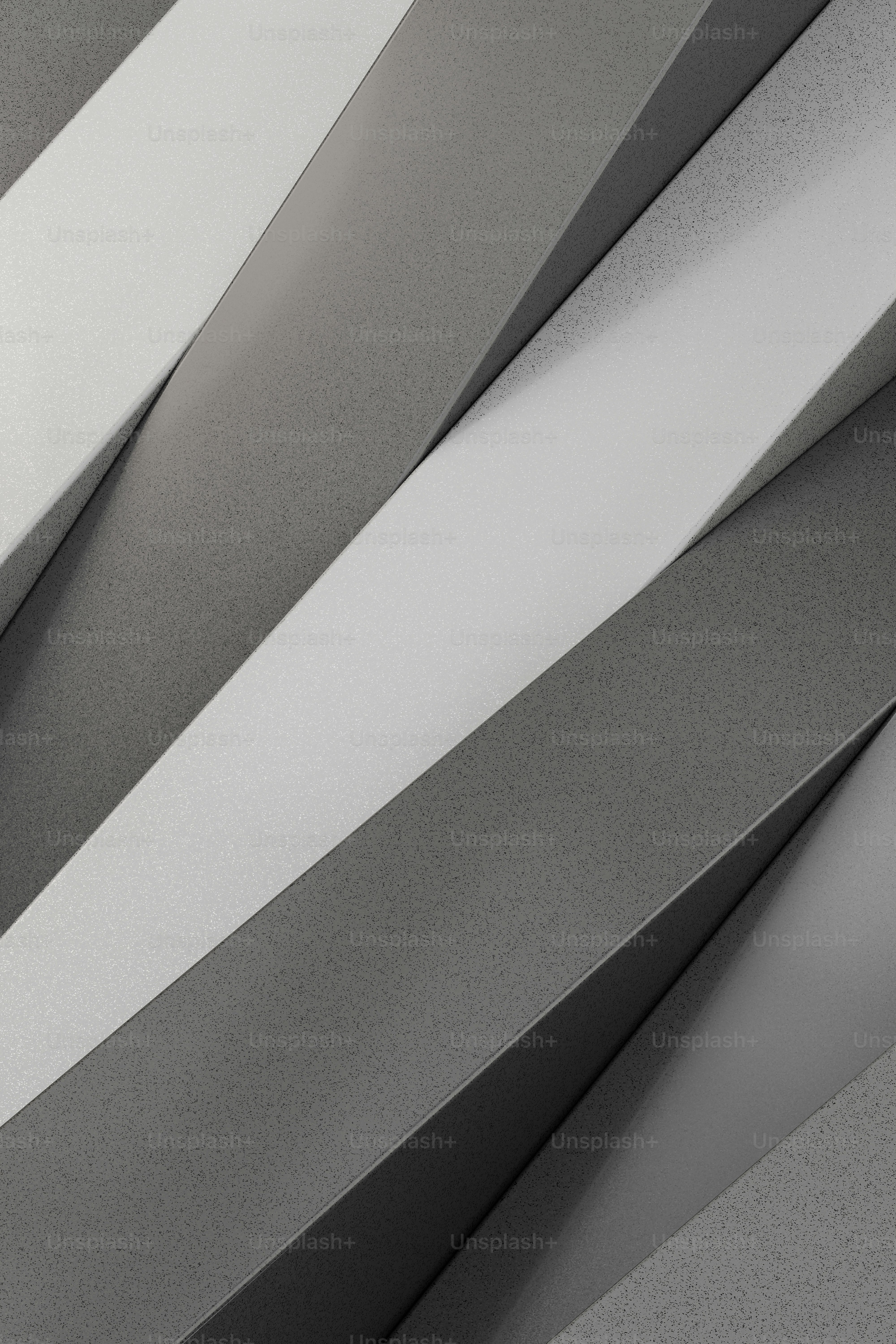 a black and white photo of a clock on a wall