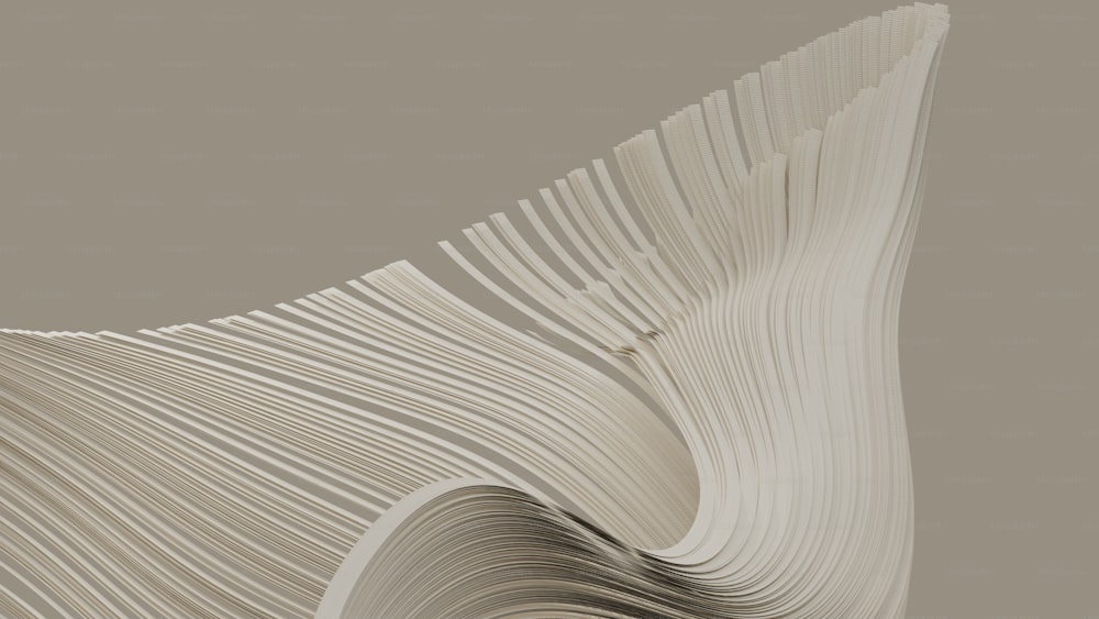 un gros plan d’un objet blanc avec des lignes ondulées