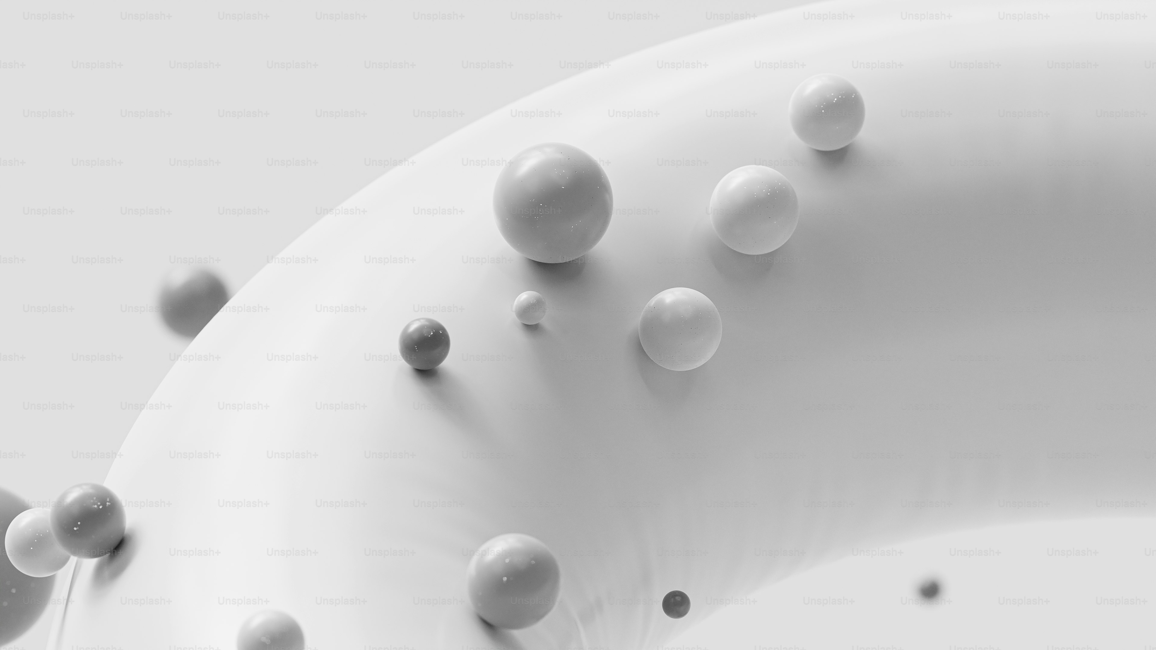 A group of balls floating in the air photo – Wallpaper Image on Unsplash