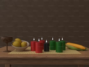 una mesa cubierta con velas y un cuenco de fruta