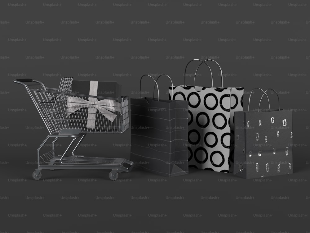 a shopping cart and three shopping bags on a gray background