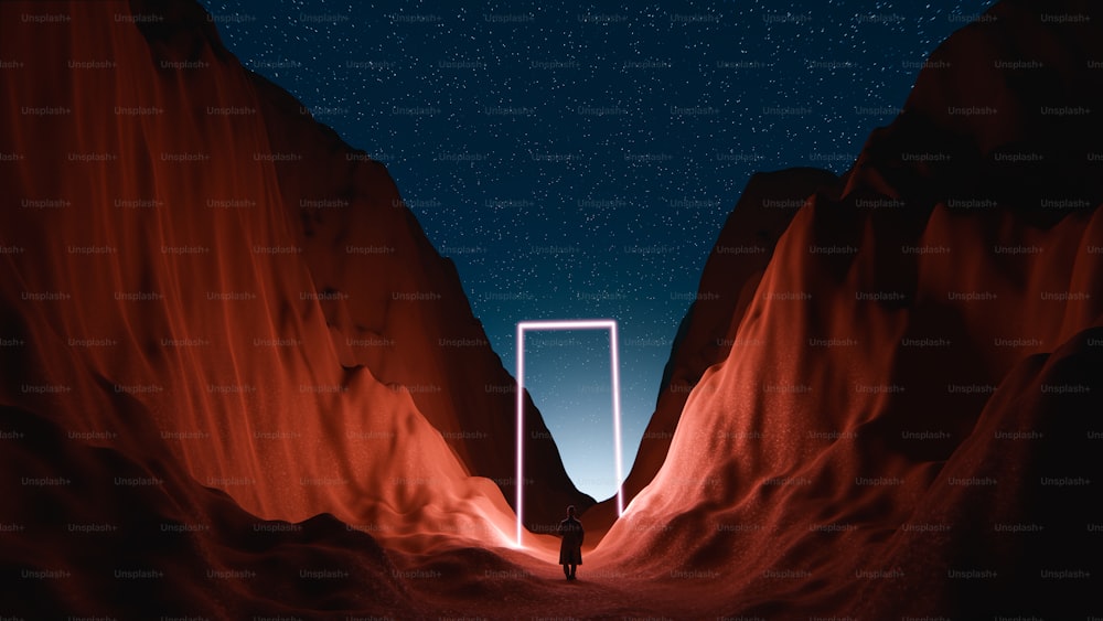 밤의 사막 한가운데에 서 있는 사람