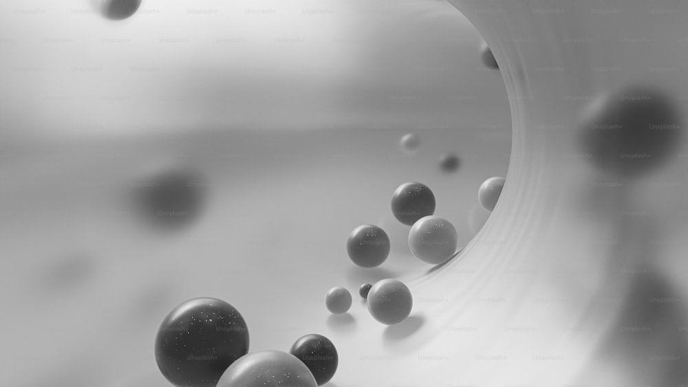 a black and white photo of a bunch of balls