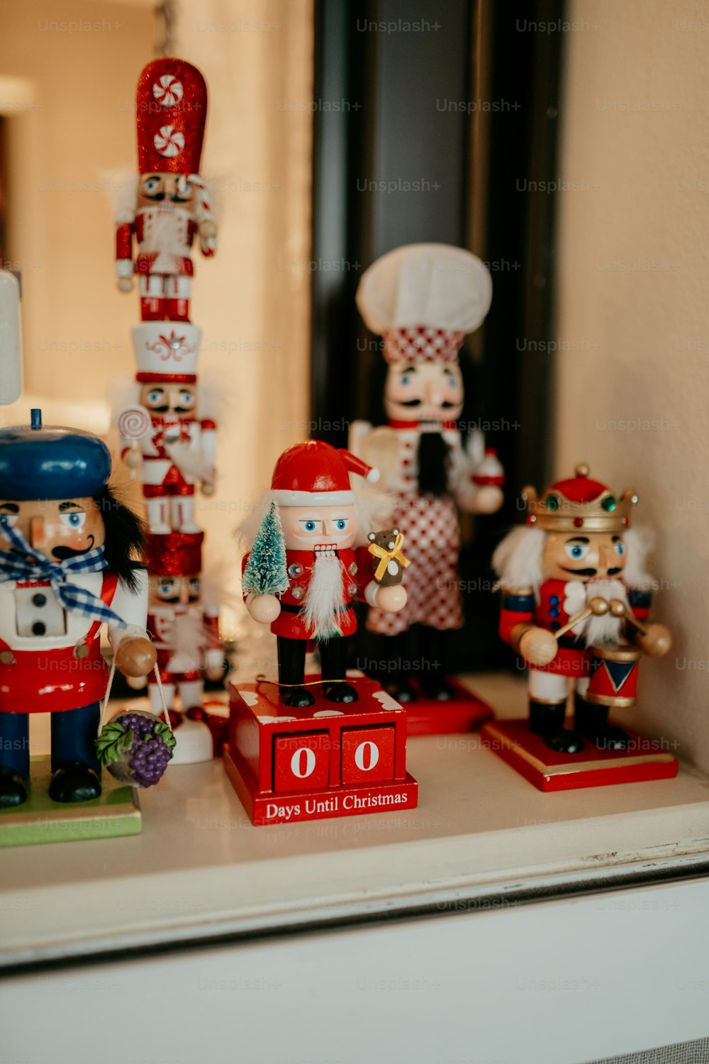 a group of nutcrackers sitting on top of a counter