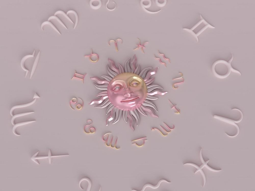 ピンクの太陽に顔と文字が描かれている