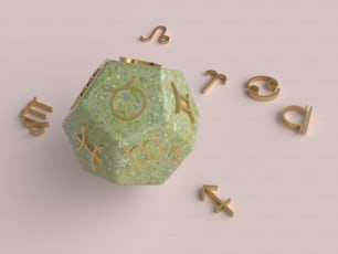 a green dice surrounded by gold letters