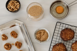 a table topped with cookies and peanut butter