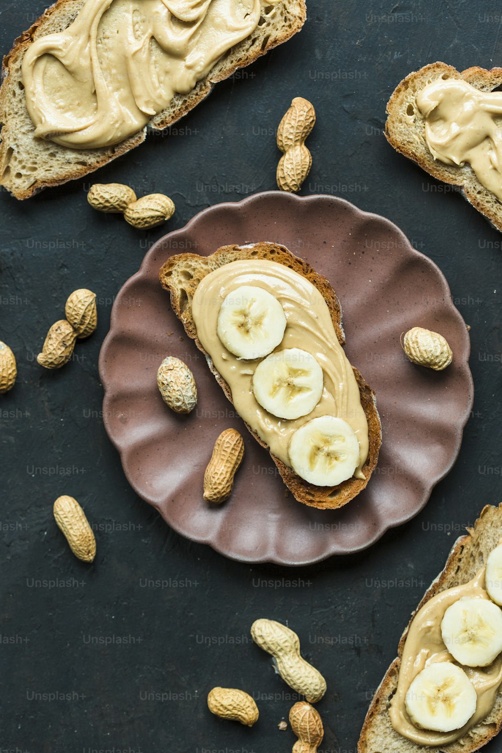 a peanut butter and banana sandwich on a plate