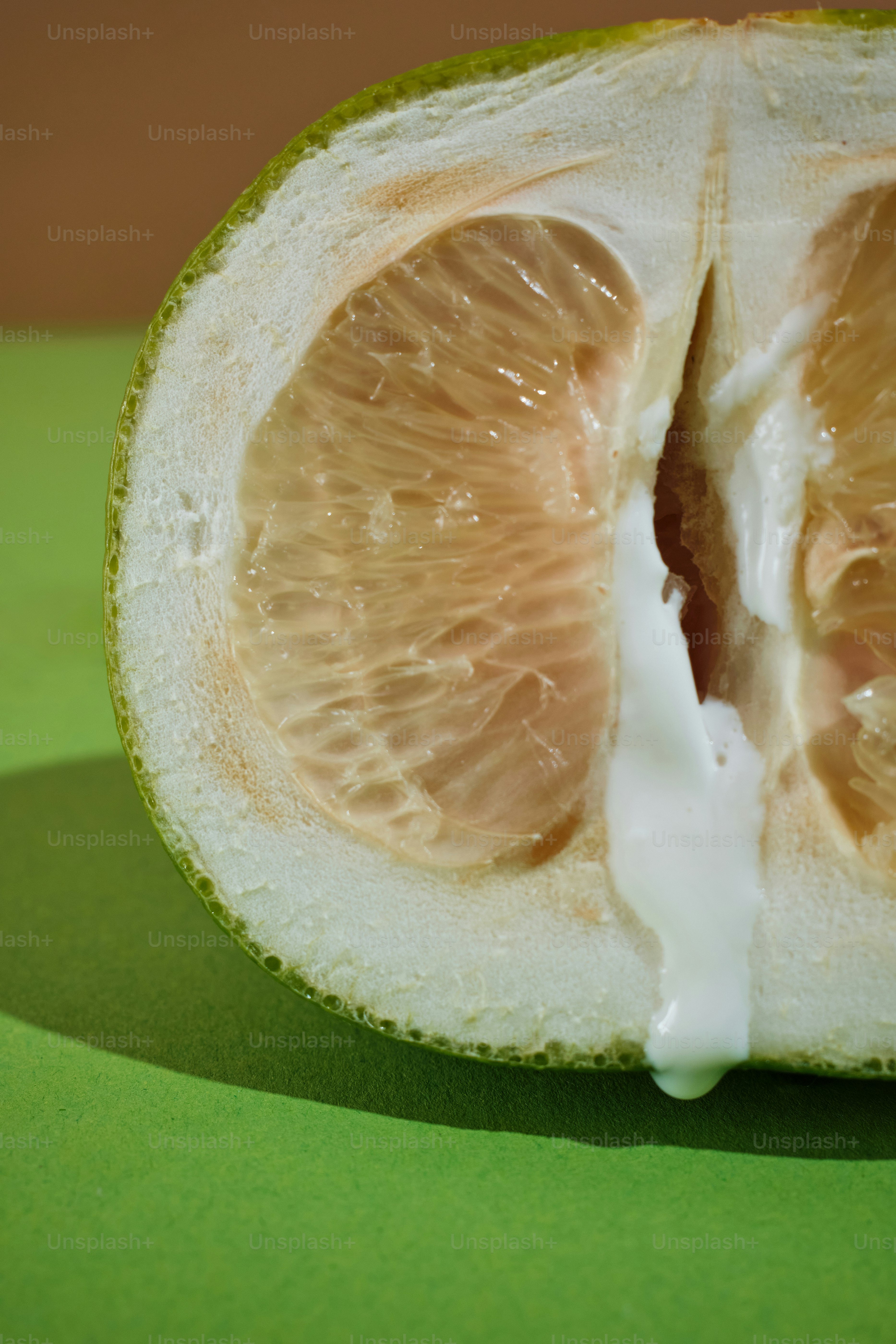 a piece of fruit that has been cut in half