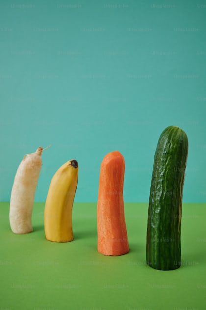 A Cucumber Banana And Carrot Are Arranged In A Row Photo Penis Image On Unsplash