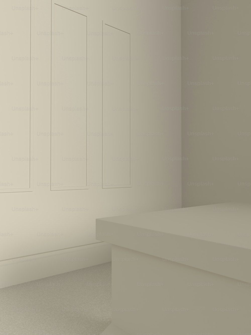 a white room with a white counter and a white wall