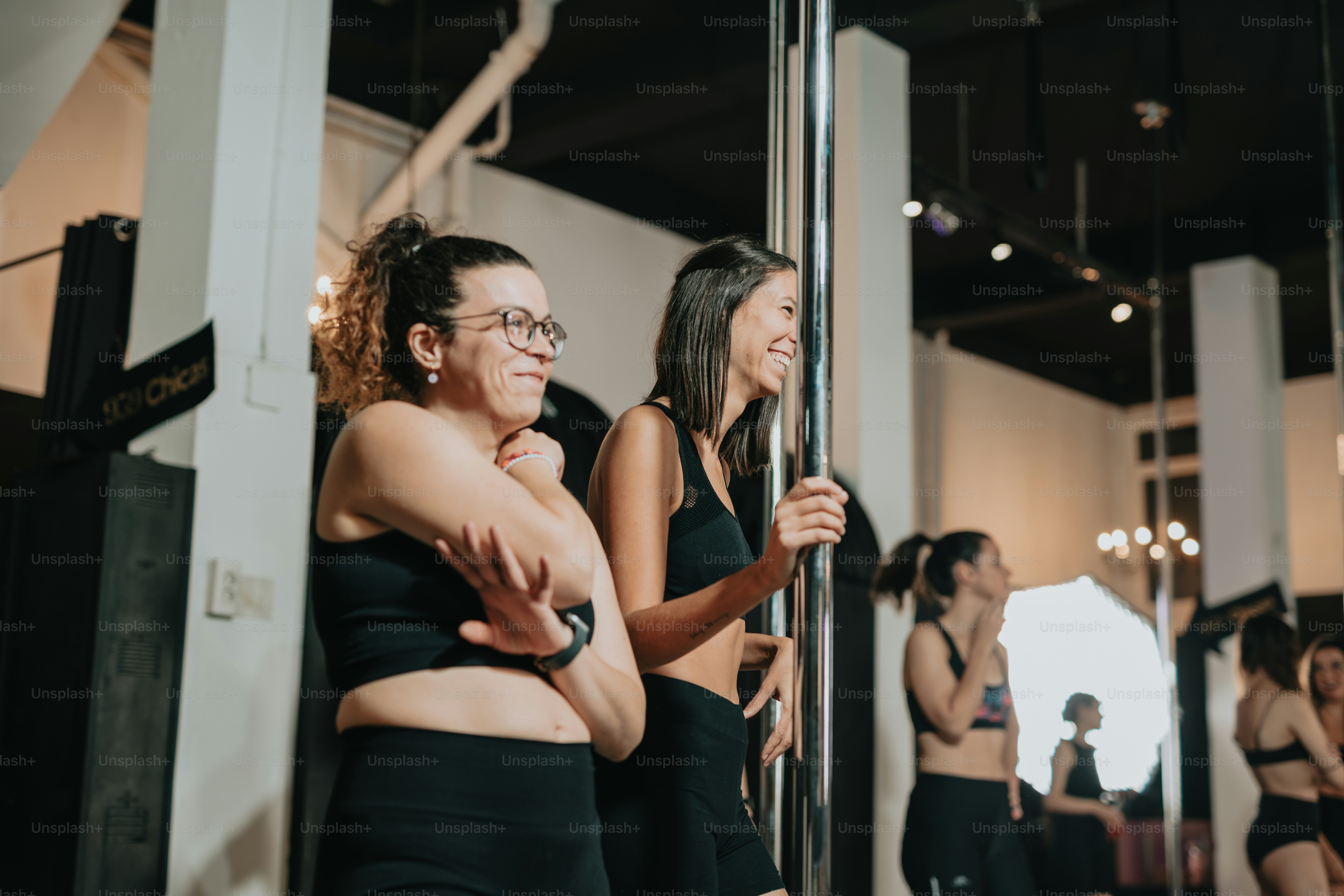 a couple of women standing next to each other