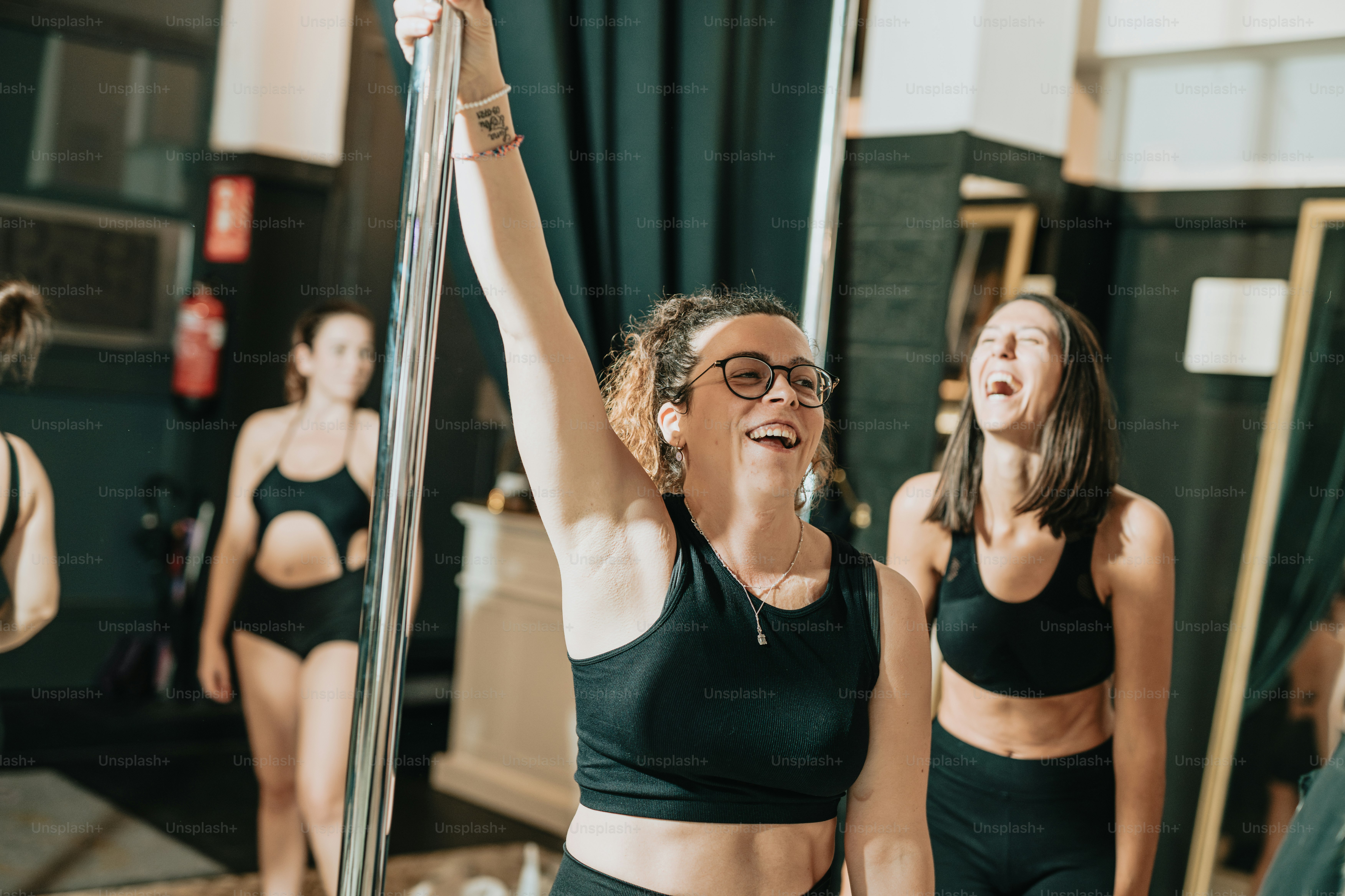 a group of young women standing next to each other