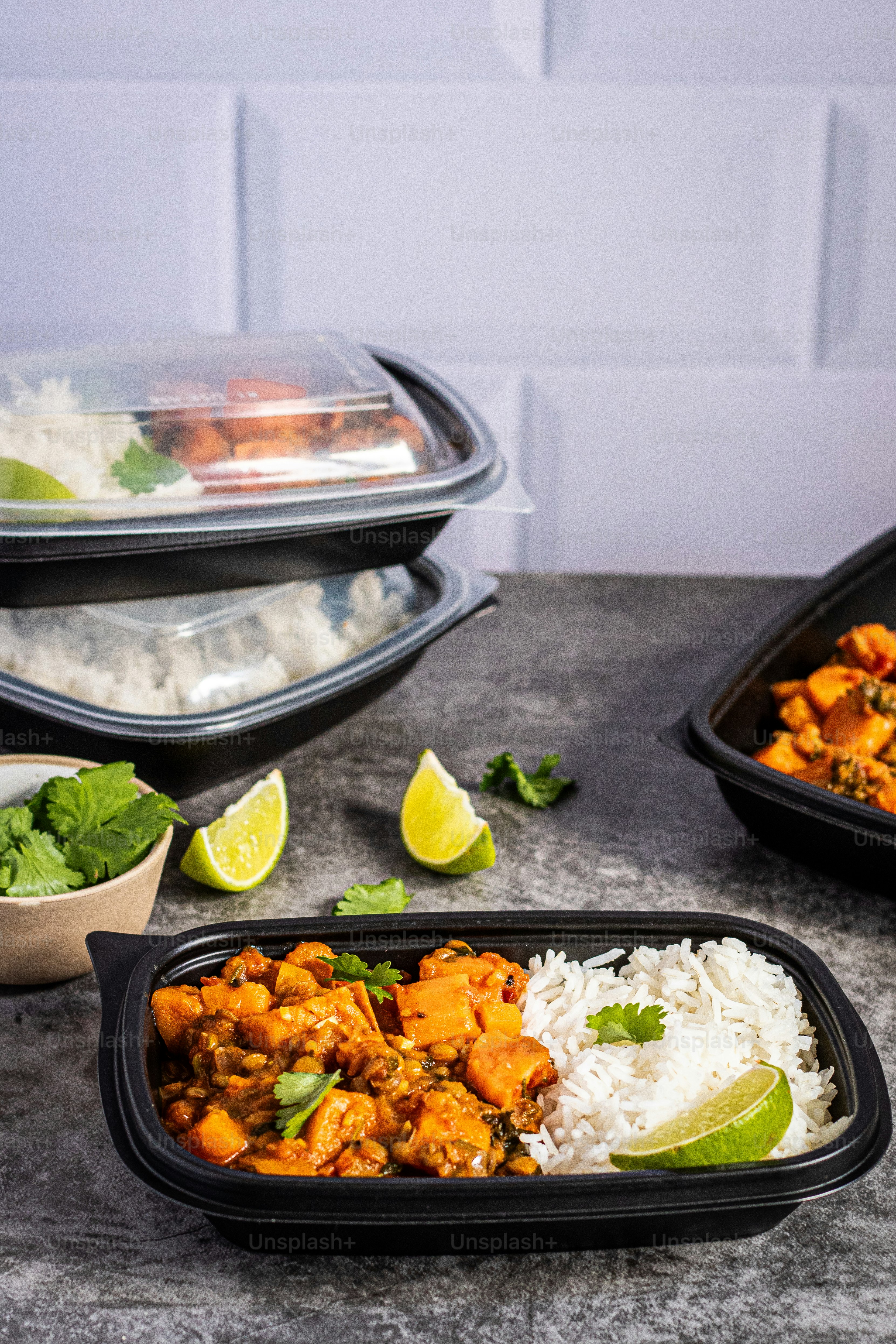 Meal-prepped affordable meatless meals packed into containers for the week