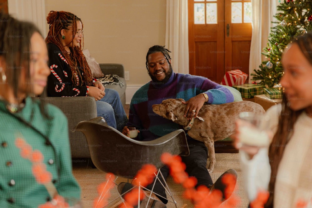 a group of people sitting around a living room