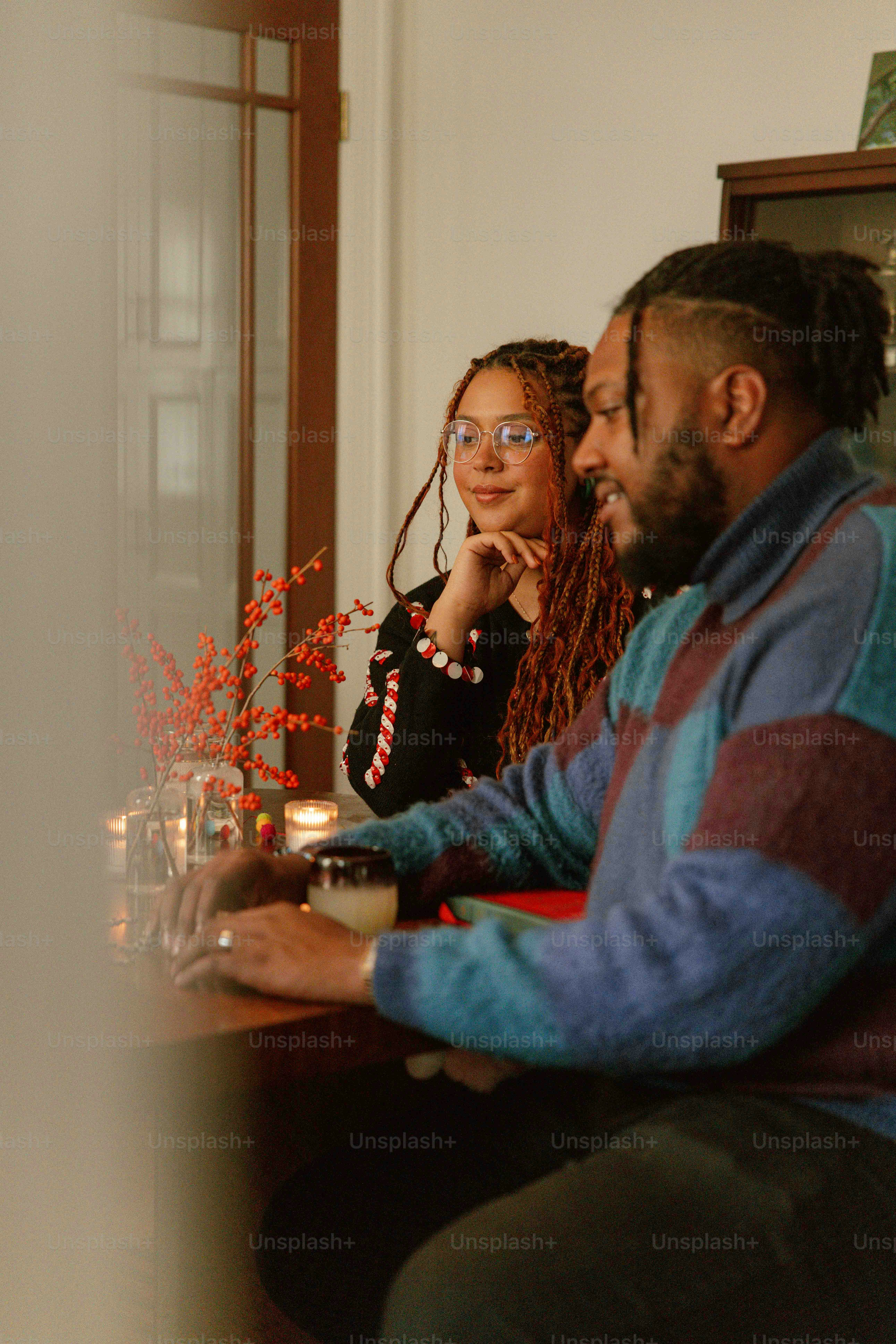 a man and a woman sitting at a table