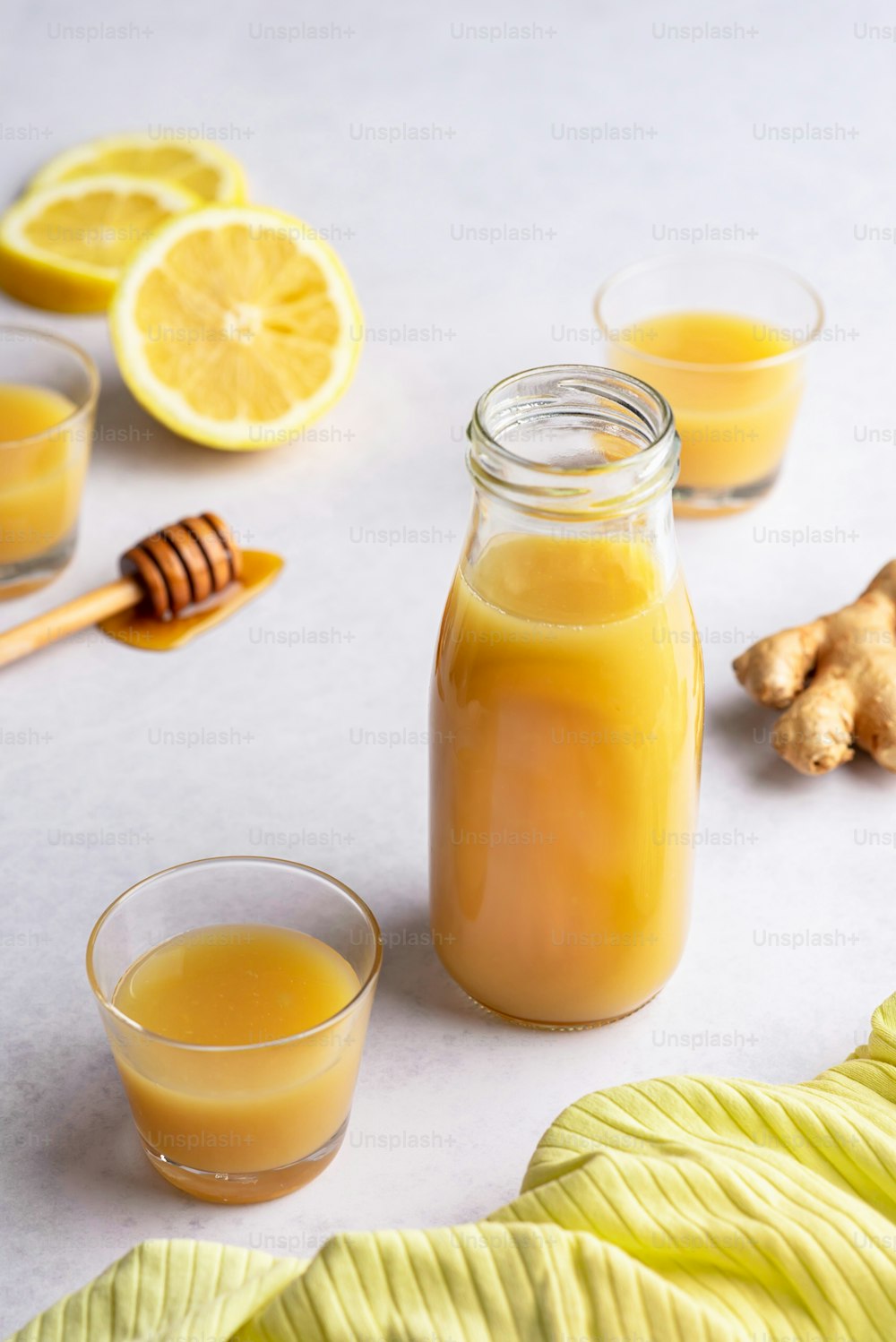 a jar of liquid sitting on top of a table