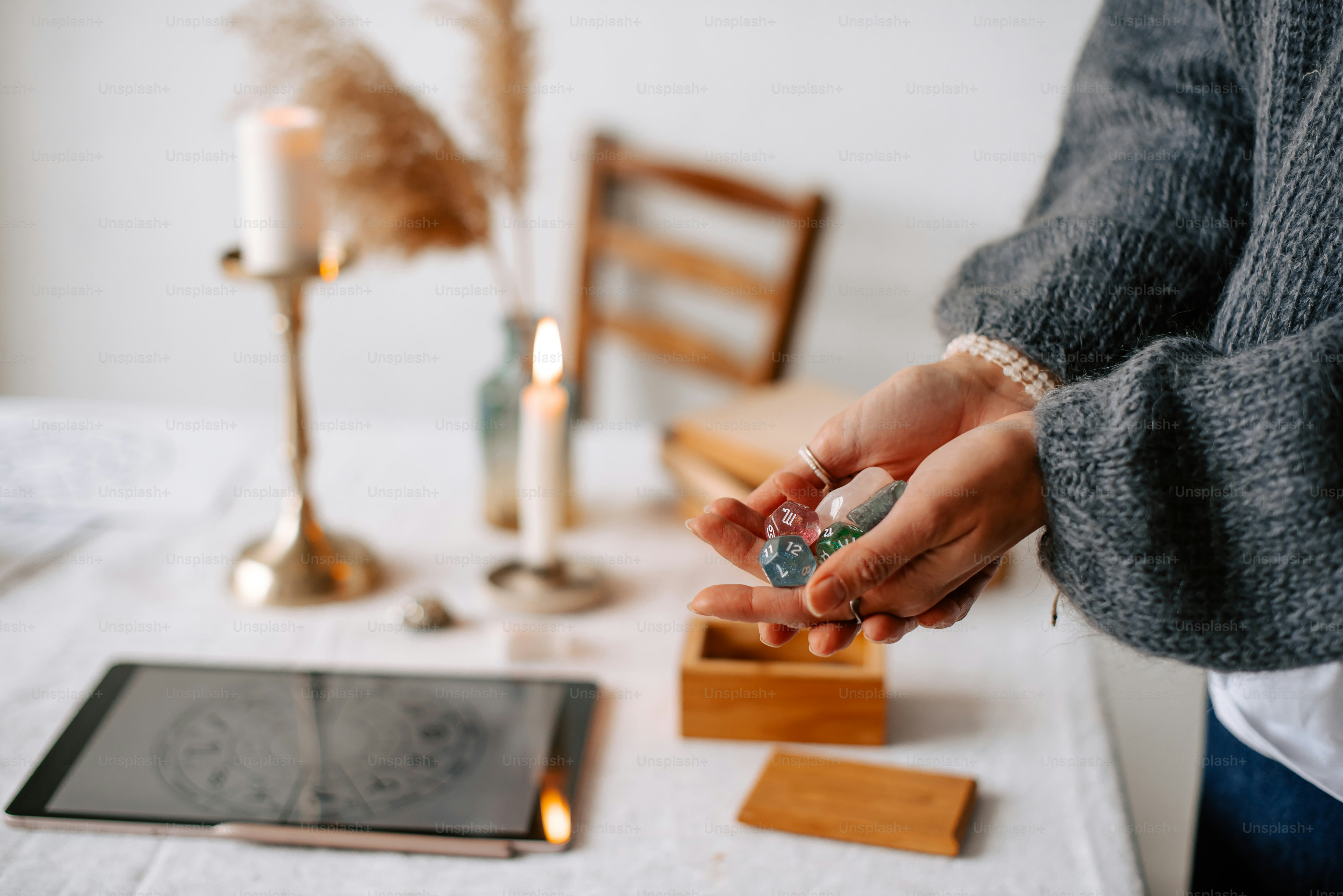 A person holding a small object in their hand photo – Reading Image on ...