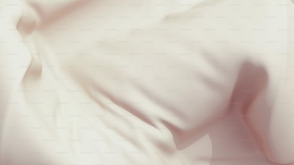 a blurry photo of a bed with white sheets