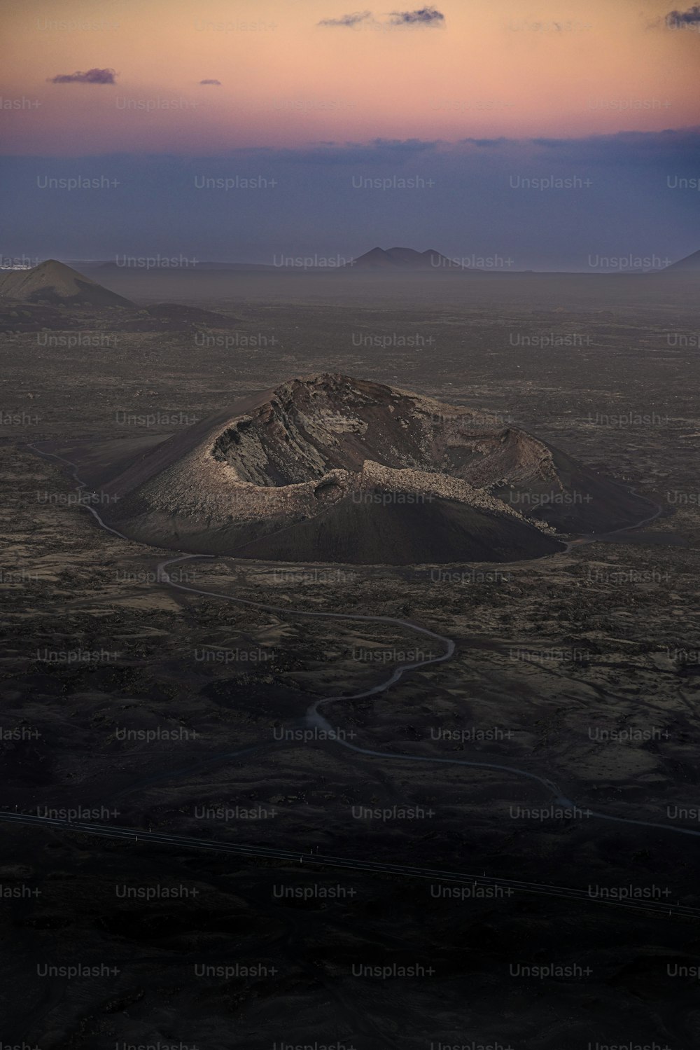 a mountain with a river running through it