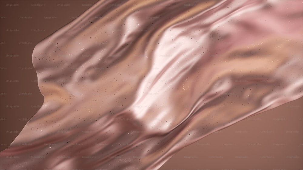 Ein abstraktes Bild eines rosa-goldenen Stoffes