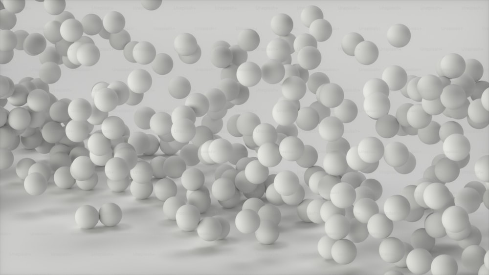 a group of white balls floating in the air