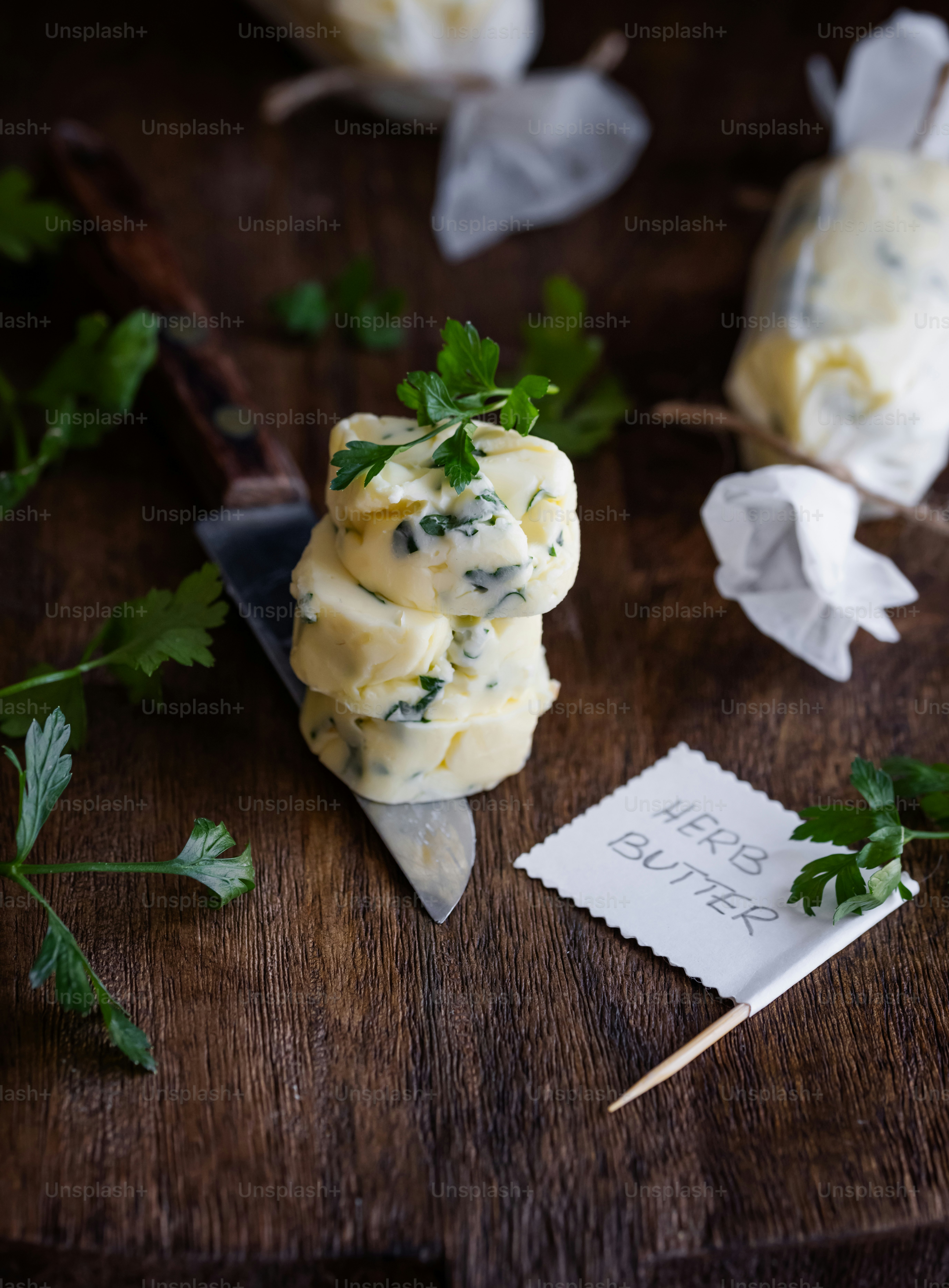 a wooden table topped with a pile of food