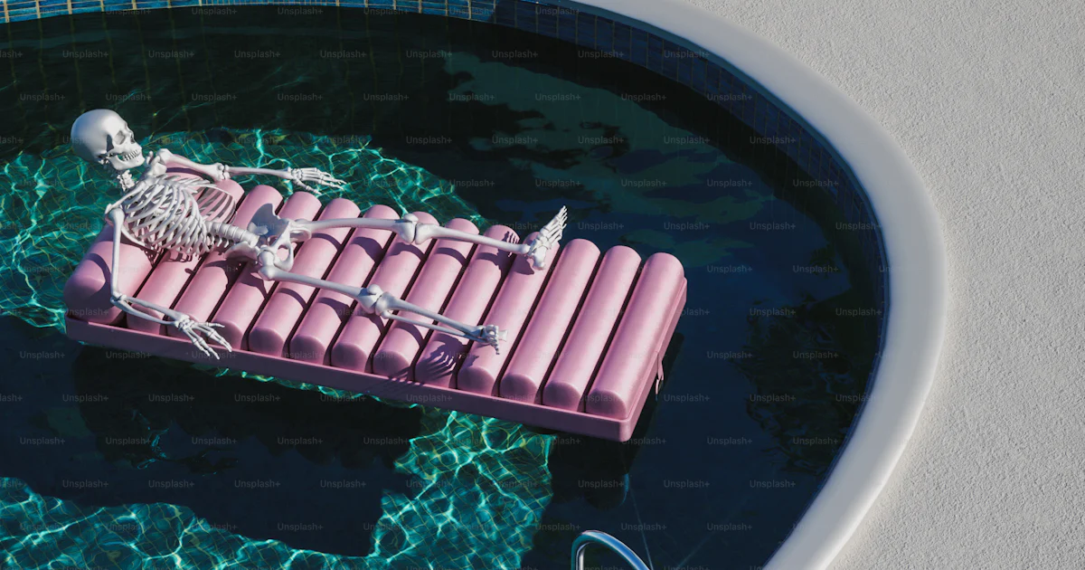 Pink Inflatable Raft A pink inflatable raft floating on top of a pool photo – Render Image ...