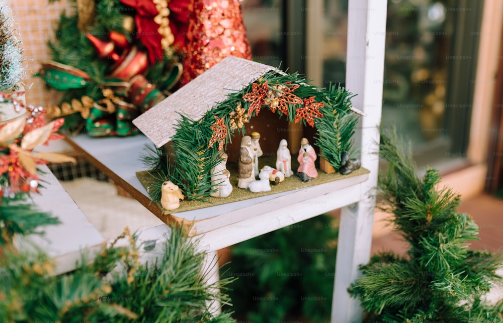 a christmas scene of a nativity scene on a shelf