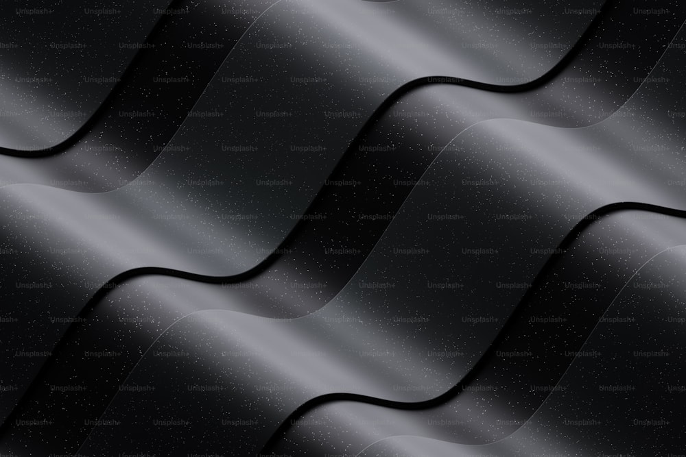 a black and silver background with wavy lines
