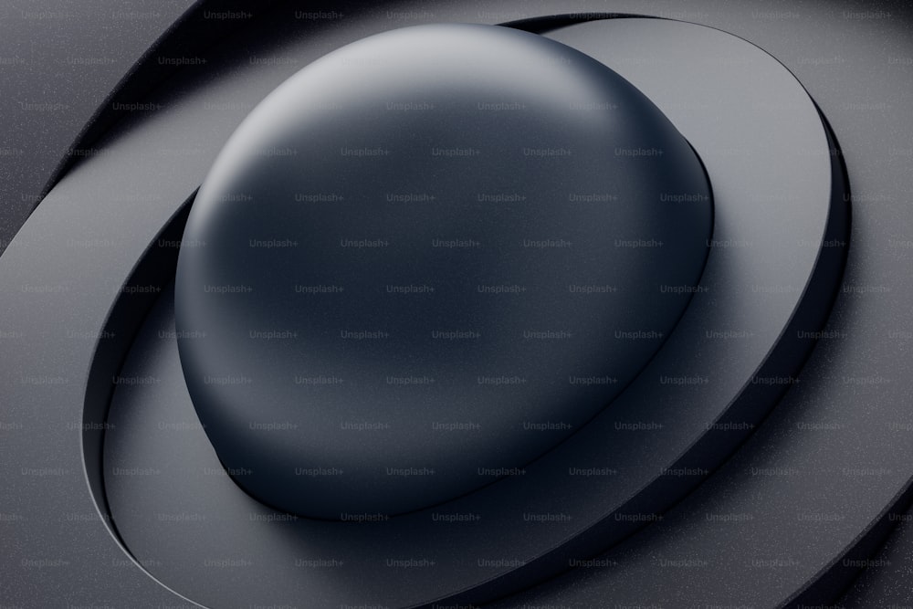 a close up of a circular object on a black surface