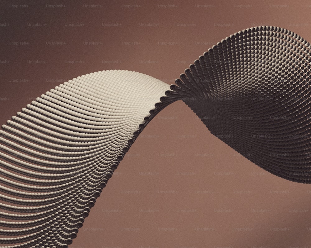 an abstract photo of a curved object with a brown background