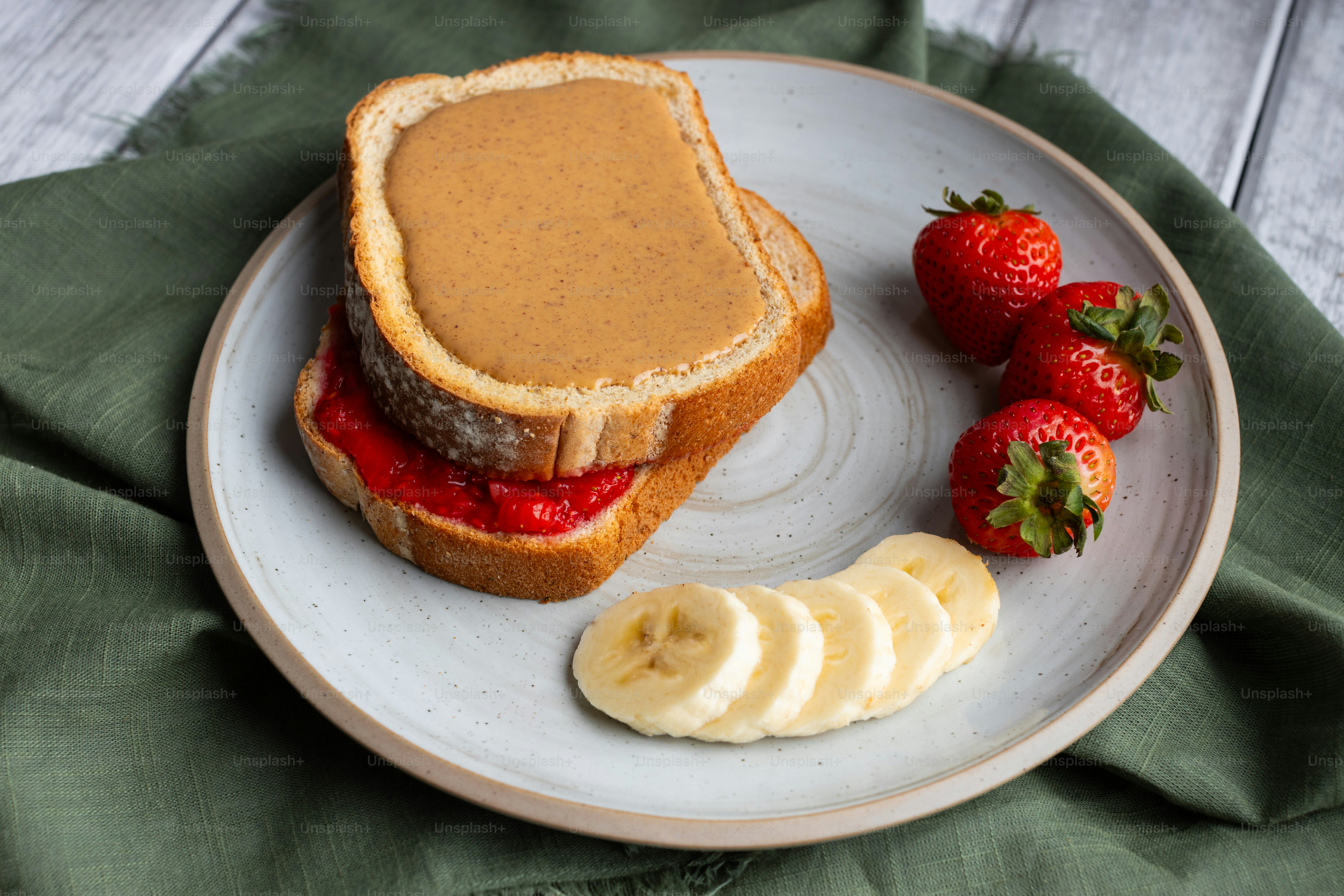 a peanut butter and jelly sandwich on a plate