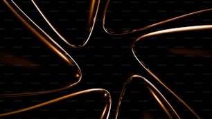 a black background with gold lines and curves