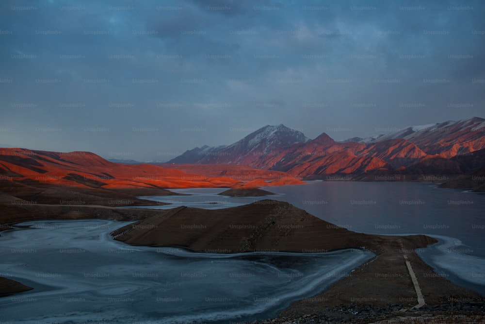 a large body of water surrounded by mountains