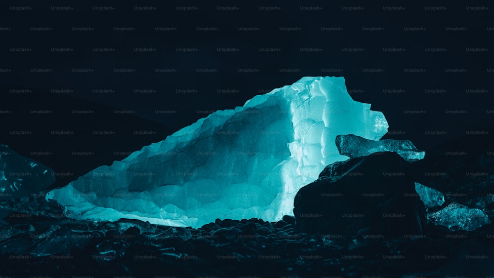 a large iceberg in the middle of the night