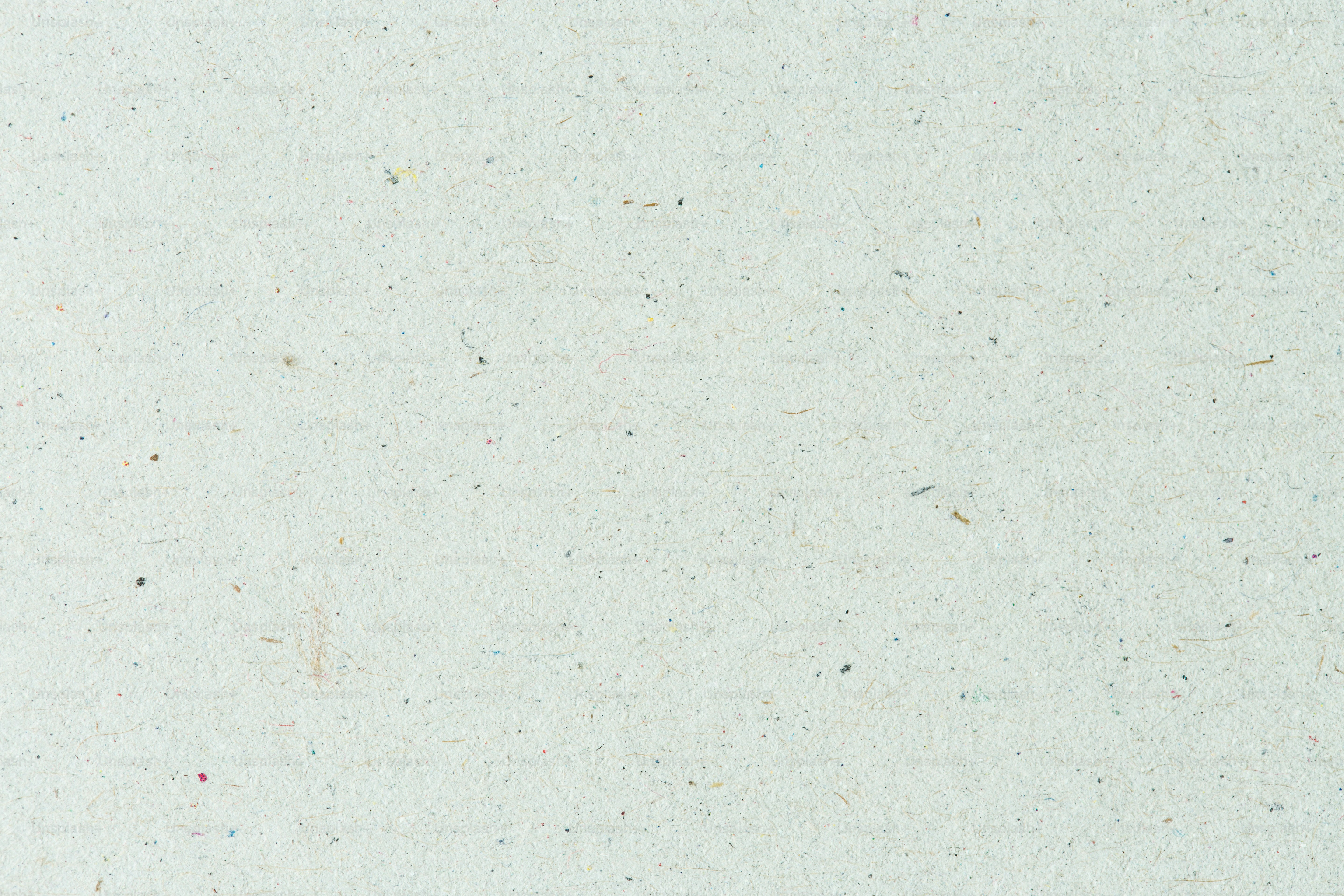 a white background with small speckles of paint