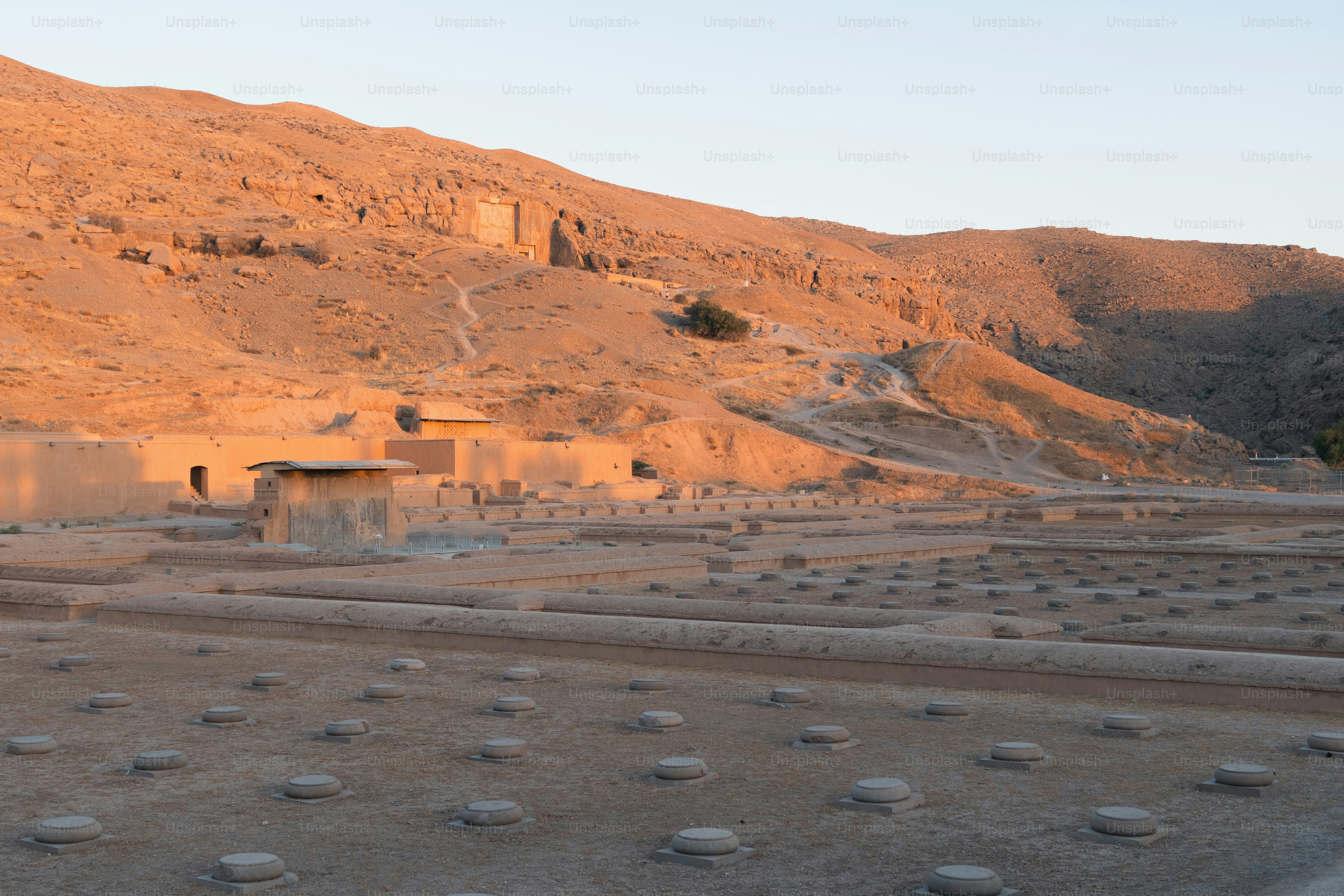 a building in the middle of a desert