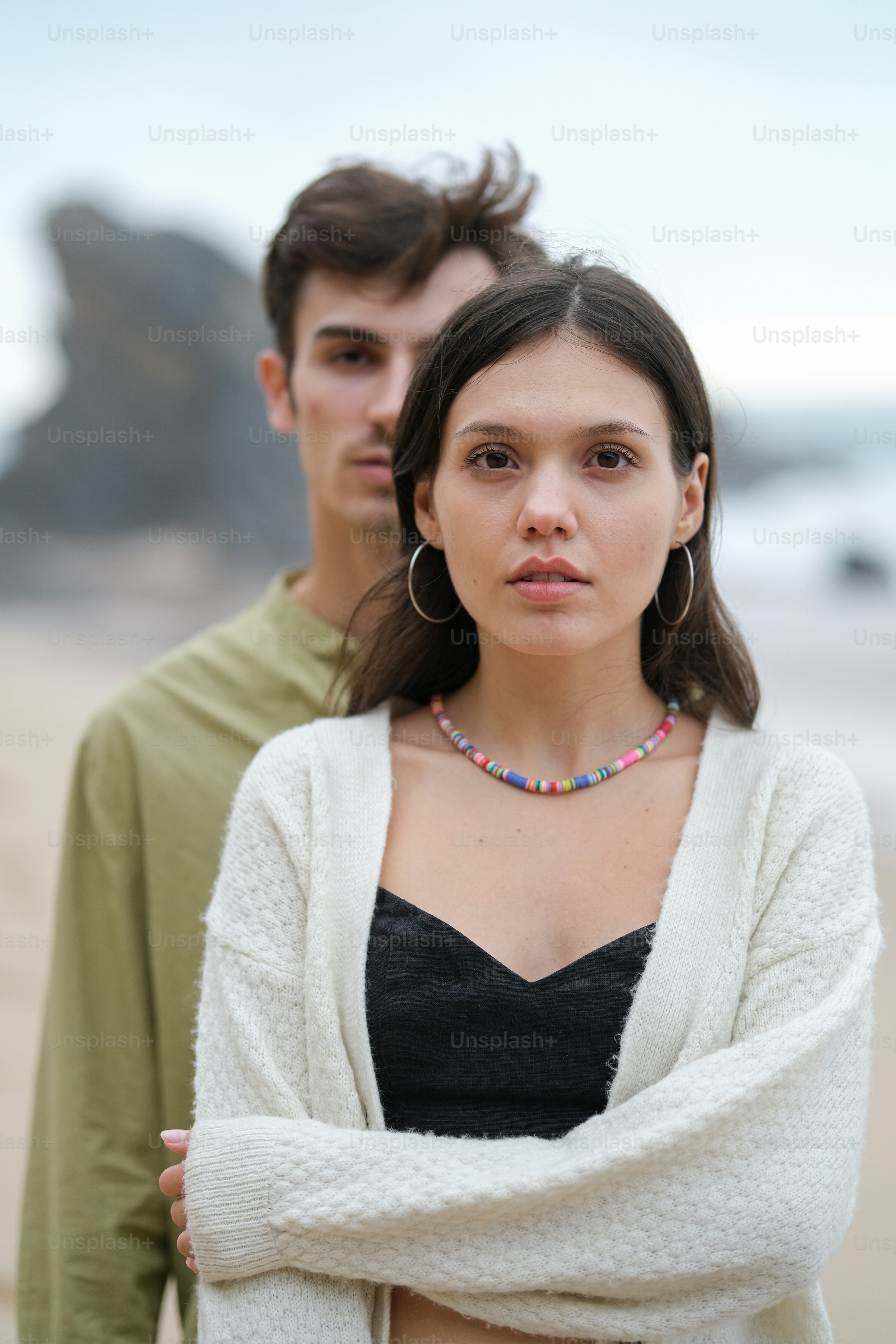 a man and a woman standing next to each other