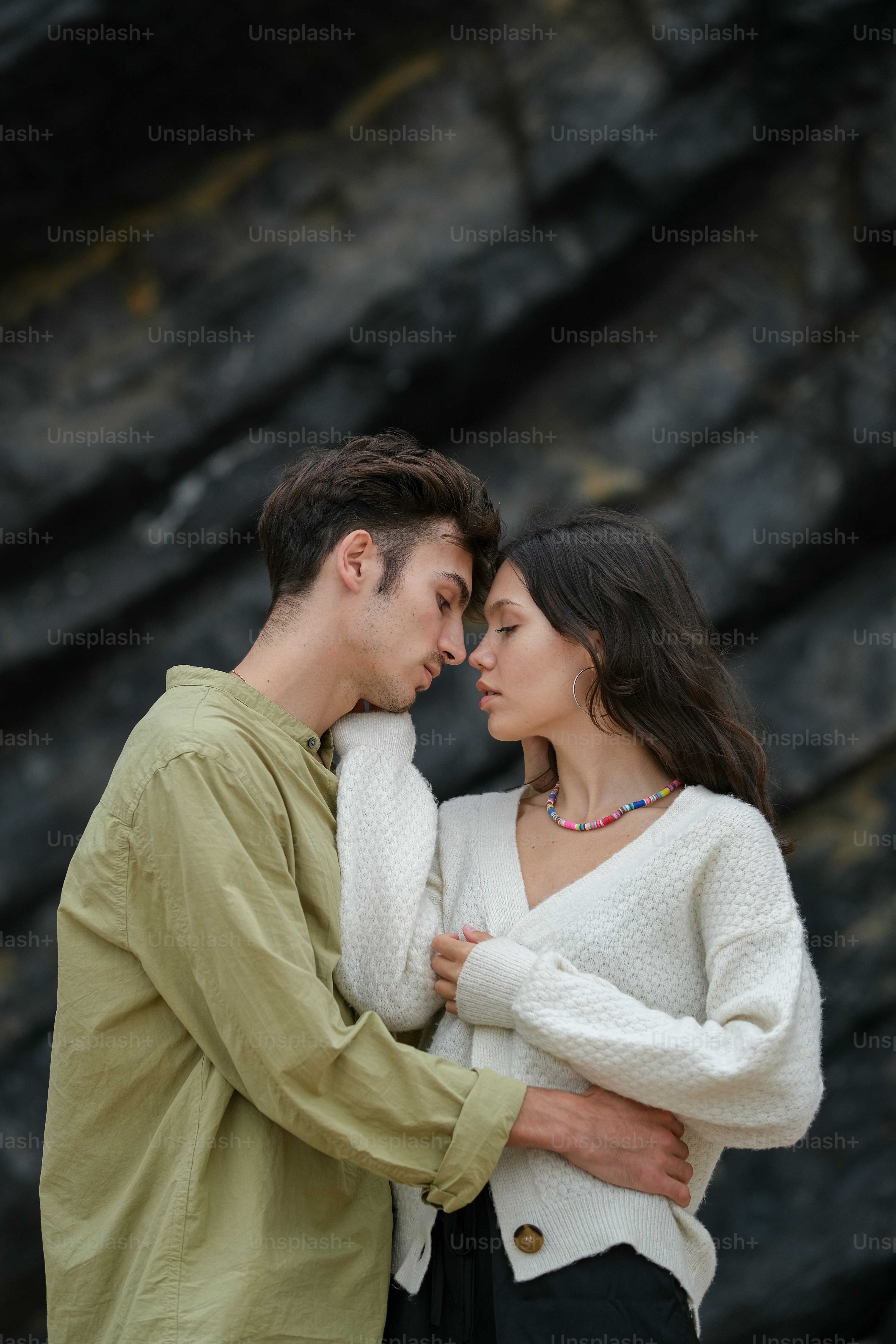 a man and a woman standing next to each other