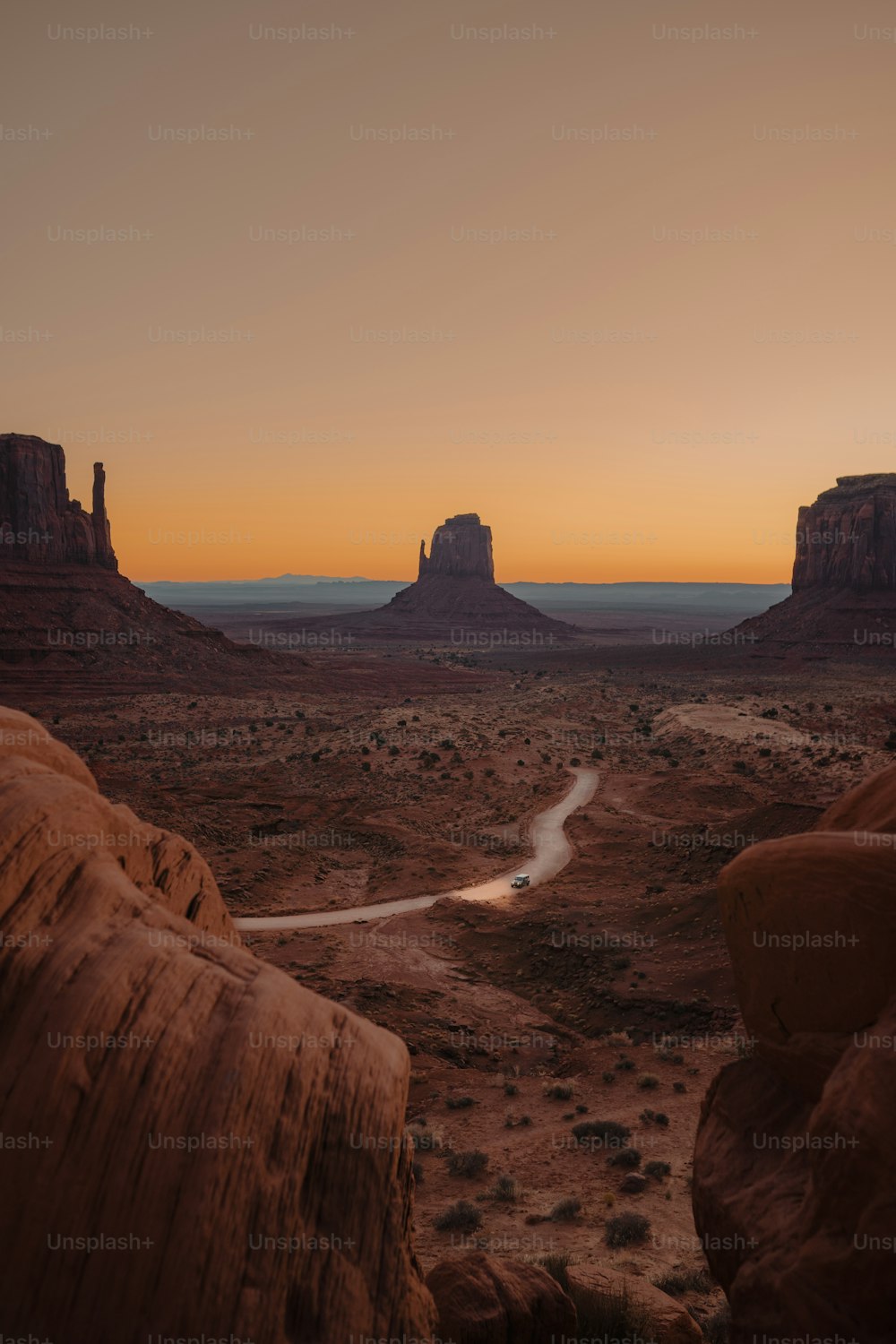 a desert landscape with a river running through it